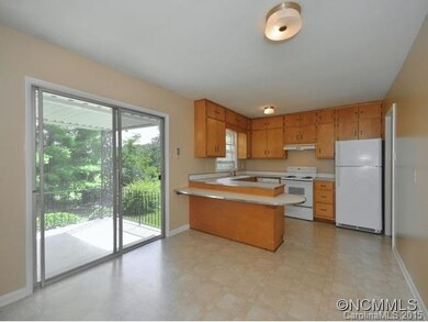Kitchen open to covered porch