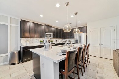 Enormous QUARTZ COUNTER ISLAND/BREAKFAST BAR with 