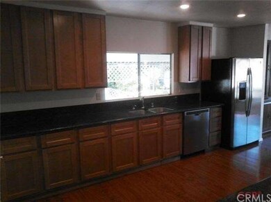 Notice the abundance of kitchen cabinets, large pa