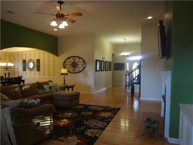 Living Room with Vaulted Ceiling, open to Kitchen and Dining Room!