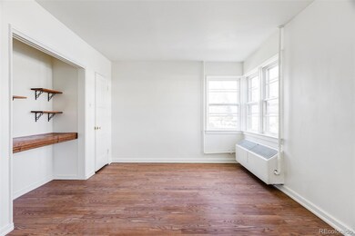 Living room with new flooring + paint