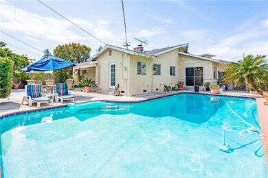 Sparkling pool in private, serene back yard.