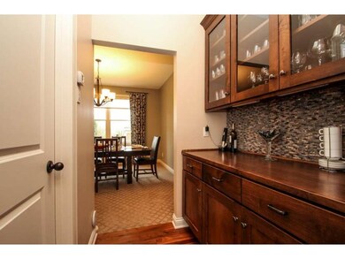 Across from this Beautiful Butlers Pantry is a Lar