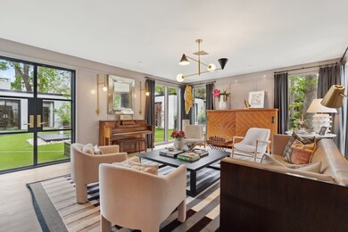 The FORMAL LIVING ROOM is versatile space also off