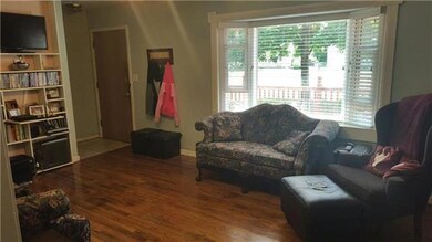 Large Front Room - Bay Window, Built in Bookshelf 