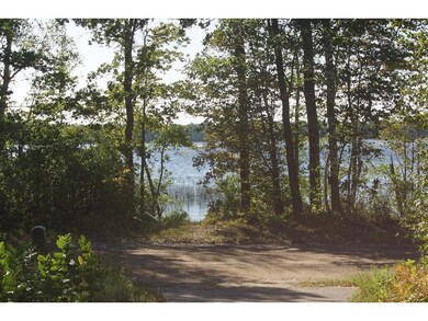 Lake view from the asphalt driveway.