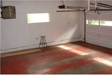 Extra deep and tall heated 2 car attached garage.