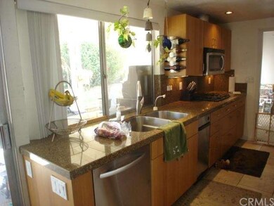 Granite counters, stainless steel sink, dishwasher