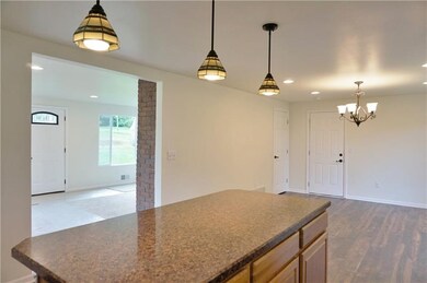 Kitchen island for extra counter space! Modern lig