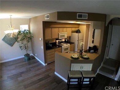 Kitchen and partial view of Dining room