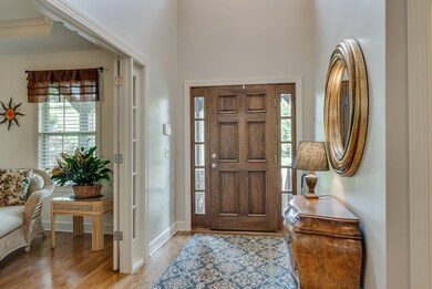 Entry way with tall ceiling.