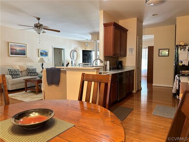 Dining area with sink, plenty of natural light, ce
