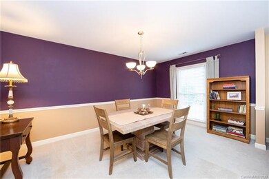 Large dining room with plenty of room for a HUGE d