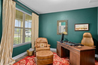 To the left as you enter the home is a dedicated study overlooking the front porch. This room gets fantastic natural light throughout the day!