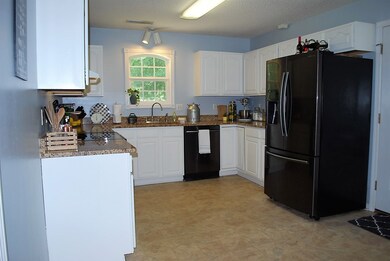 Kitchen with granite and a lazy susan