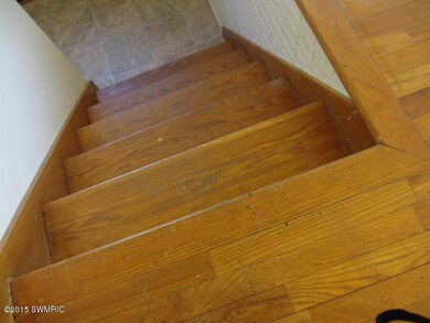 Stairs view of Hardwood Floor Condition