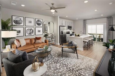 Living area with light wood-type flooring, recessed lighting, and ceiling fan