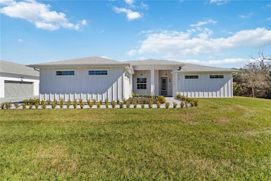The front facade of the house draws you in as you quickly notice all the details that when into wrapping the entire structure in Board and Batten, which exudes quality craftsmanship and timeless architecture