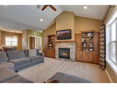 vaulted main floor family room, gas fireplace