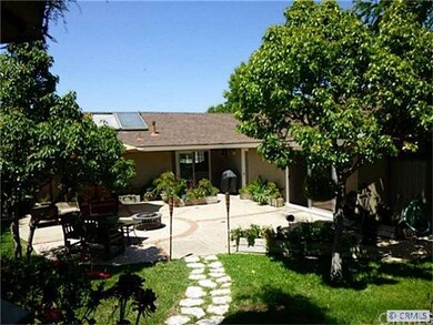 View from one patio area to the back of the house