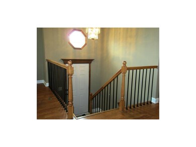Entry Updated with Wrought Iron Spindles