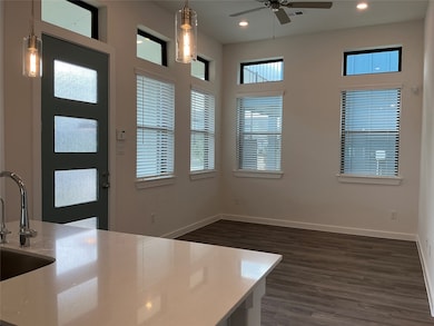 Entry foyer leads into the front living area with abundant natural light....
