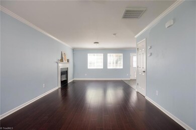 Expansive family room with gleaming engineered hardwoods
