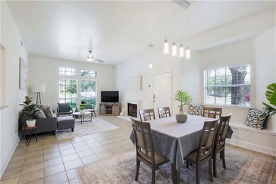 Dining area with light tile patterned flooring an