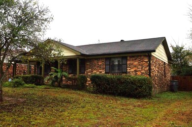 Exterior space featuring a front yard