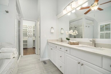 The Main Level Primary Suite Spa Like Bathroom