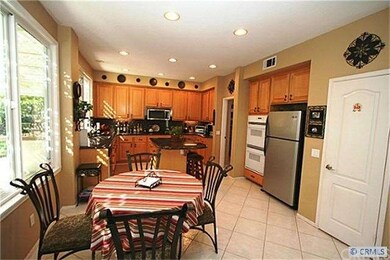 Kitchen boasts stainless steel appliances and larg