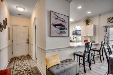 Interior space featuring ornamental molding, a tex