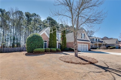 View of front of property with a garage, driveway,