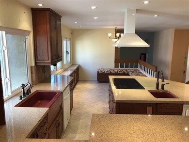 Granite counters, all appliances convey, porcelain
