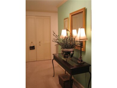 Entry/Foyer. This welcoming  foyer has a large coa
