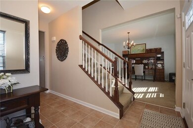 To the right of the staircase is the dining room/o