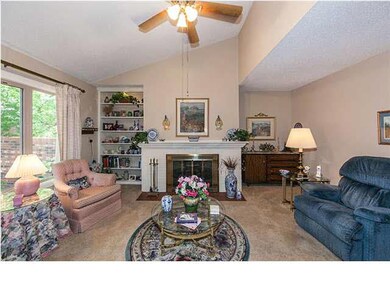 L shape Living room with wood burning fireplace