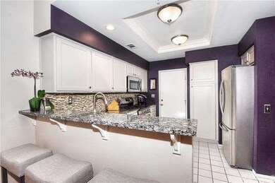 you love this purple color on the accent wall. It 