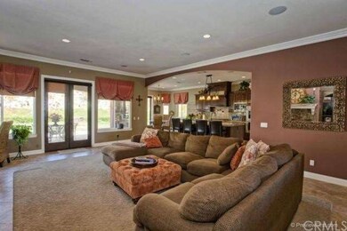 Great room with view of kitchen in main residence
