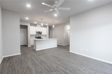 Kitchen with stainless steel appliances, recessed