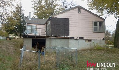Poured foundation for a storage area under the house was used for a dog shelter and run.