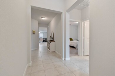 Entry into this beautiful home features ceramic ti