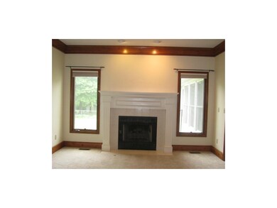 Gas fireplace is an impressive centerpiece in this