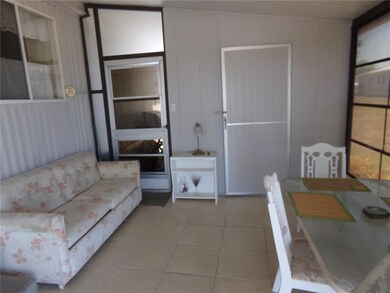 LANAI OFF OF CARPORTATTACHED SHED IN BACK DOOR