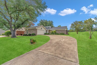 The long driveway provides parking for additional