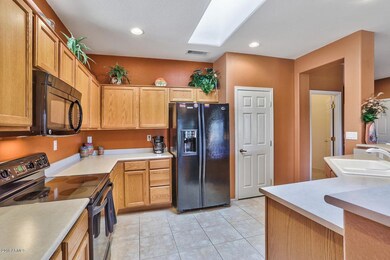 Kitchen facing frig & pantry