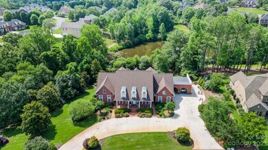 The home overlooks a community pond