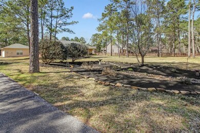 Beautiful landscaping as you pull up the driveway