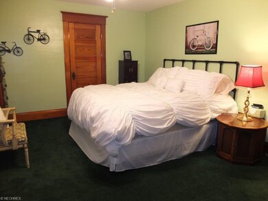 Large master bedroom with two closets.