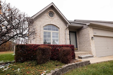 15955 Bentley Cir W, Macomb, MI 48044 - photo 2